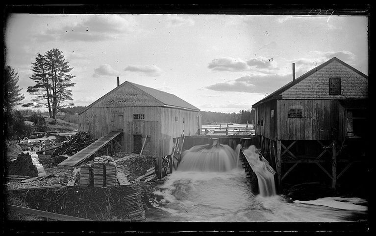          Lincoln Mills on the Dennys River; Situated on the Lincoln Mill Pond Dam, in a photograph taken by John P. Sheahan c. 1885 from the Upper, or upstream, Bridge over the Dennys River.
   