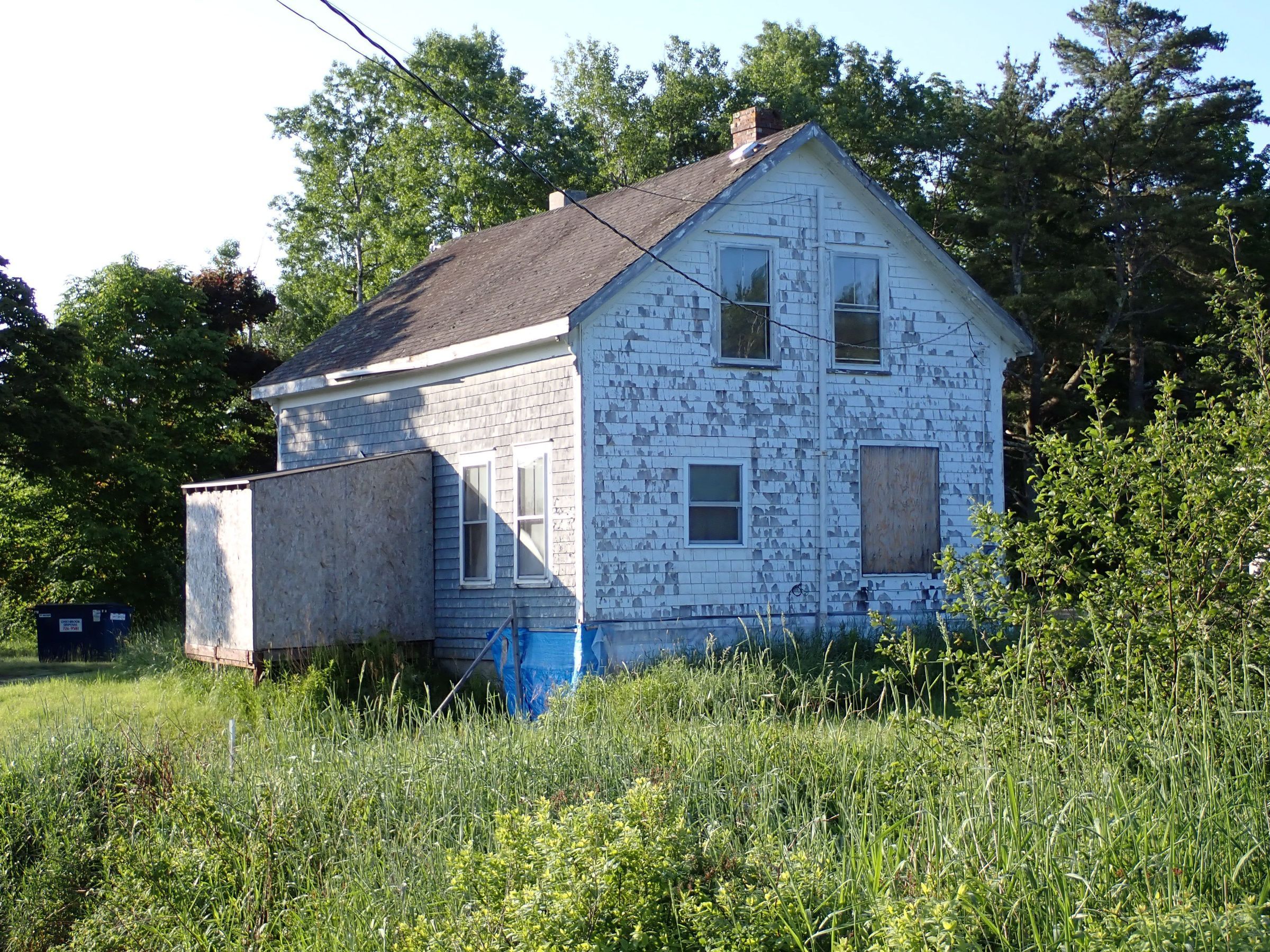 William Rice Allan's Carpentry shop relocated on The Lane in Dennysville, Maine; Originally located next to his house, this structure served as Will Allan's carpentry shop, until it was moved farther down the Lane, where is has been the the home of