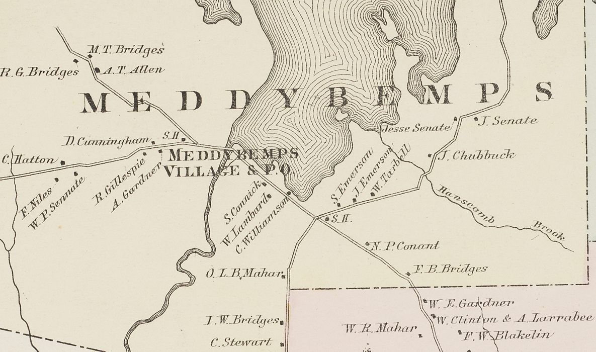 Map of Meddybemps, Maine in 1881; Detail of the Colby Atlas map of Meddybemps, Maine in 1881 shown on p 14 of the Atlas. Two schoolhouses, marked S.H., are located on either side of the village, where the Dennys River flows south from Meddybemps Lake.