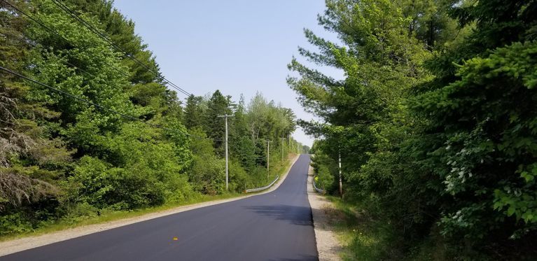          The Cathance District Schoolhouse was located toward the top of the hill on the left, on Route 86 in Edmunds, Maine.
   