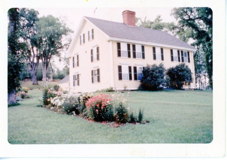          View of the Theodore Lincoln House, Dennysville, Maine, c. 1960; Exterior view of the Dennysville's Lincoln House when it was owned and operated by Dorothy Casey as a bed and breakfast establishment for passing travelers.  The old barn can be seen on the hill behind the house, before it was taken down and removed in 1970.
   