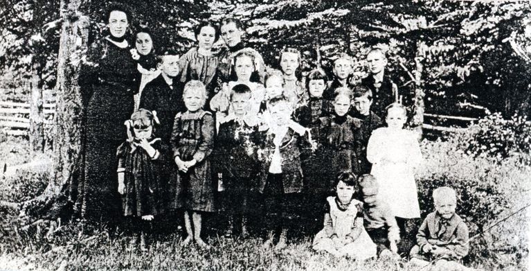          Little Falls School, Edmunds, Maine; l-R, Teacher Phoebe (McDonald) Saunders, seated Elsie Gardner, Bertie Lingley, Alvery Lingley, Front Row, standing:  Drucilla Hobart, Bessie Stanhope, Ralph Hobart, Chester Hobart, Verna Cook, Pearly Phinney.  Second Row: Ben Hobart, Iva Phinney, Elsie (/) Gardner, Diantha Gardner, Richard Hobart.  Third Row: Clara Hobart, Edith Seeley, Persis Smith, Edith Stanhope, Gene Cook, Manly Stanhope.
   