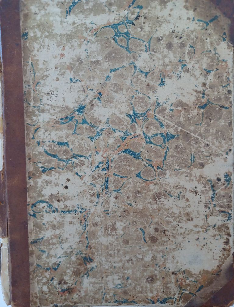          Cover showing marbeled paper-covered boards and 3/4 calf binding
   