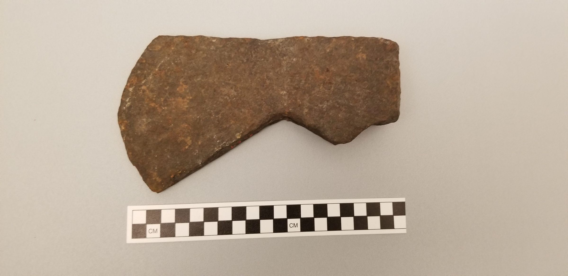 French iron axe head, 17th century, side view; Image by Colin J Windhorst from the collection of the Peabody Museum of Archaeology and Ethnology, Harvard University, 22-51-10/A5467.