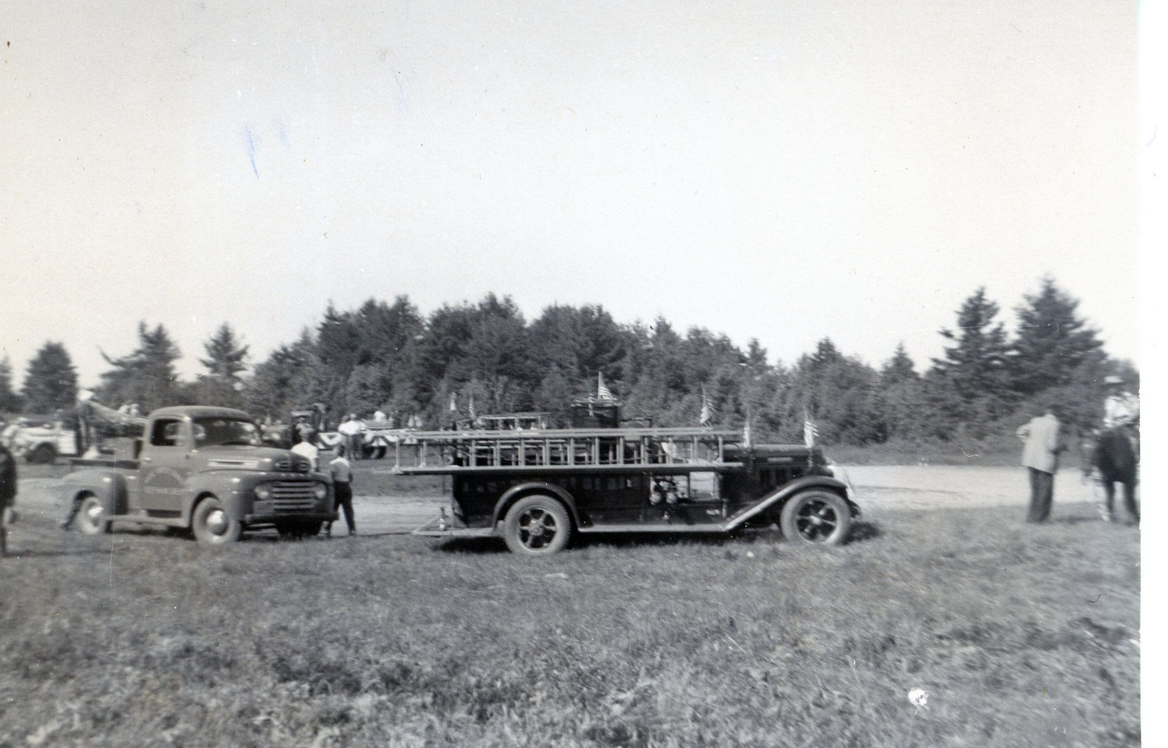 Dennysville Fire Truck at the Ball Diamond, Edmunds, Maine, on the Fourth of July, 1951.