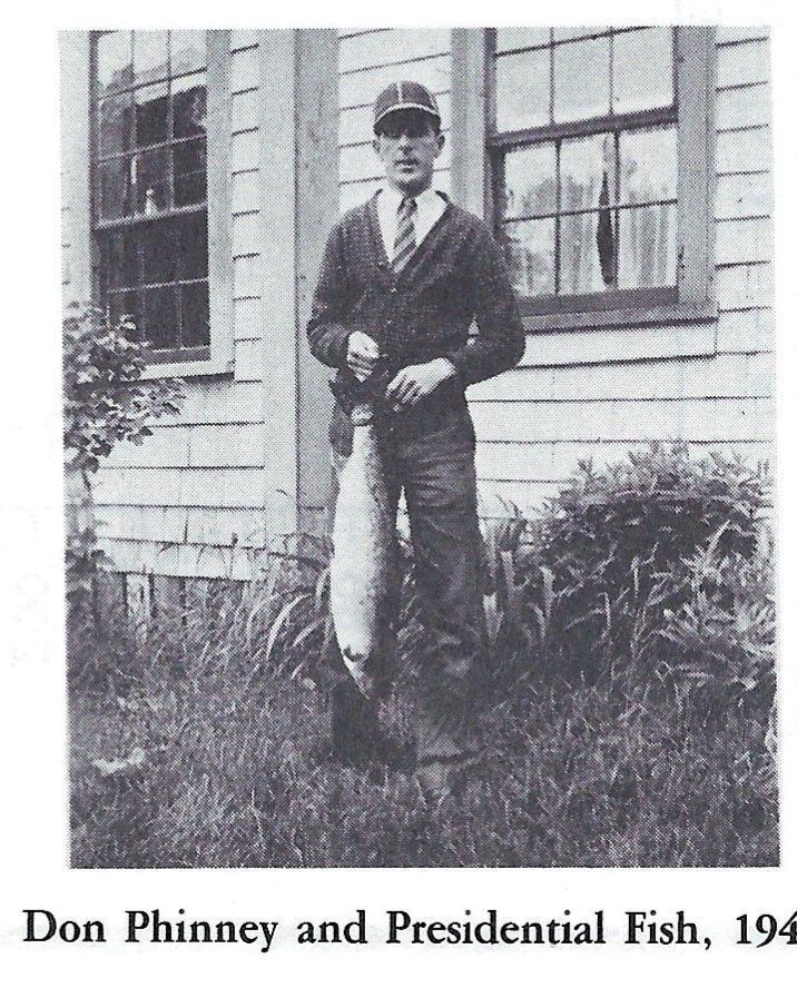          Donald Phinney and the Presidential Salmon, 1940; Donald Phinney holding the first bright run salmon caught on May 20, 1940 the Dennys River, Dennysville, Maine.  Reproduced from 