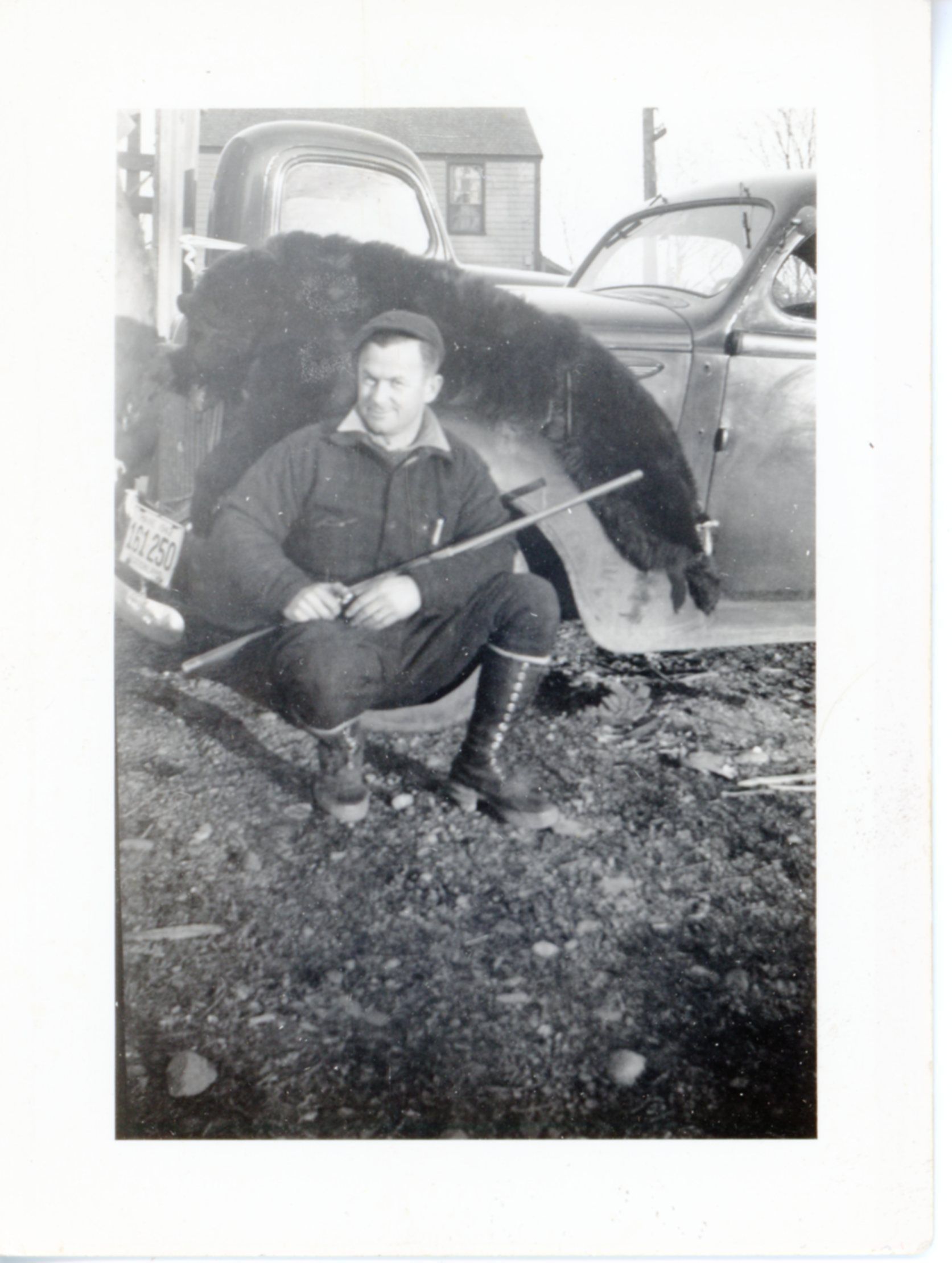 Glenn Sylvia with Bear Shot in Edmunds, Maine in 1943.