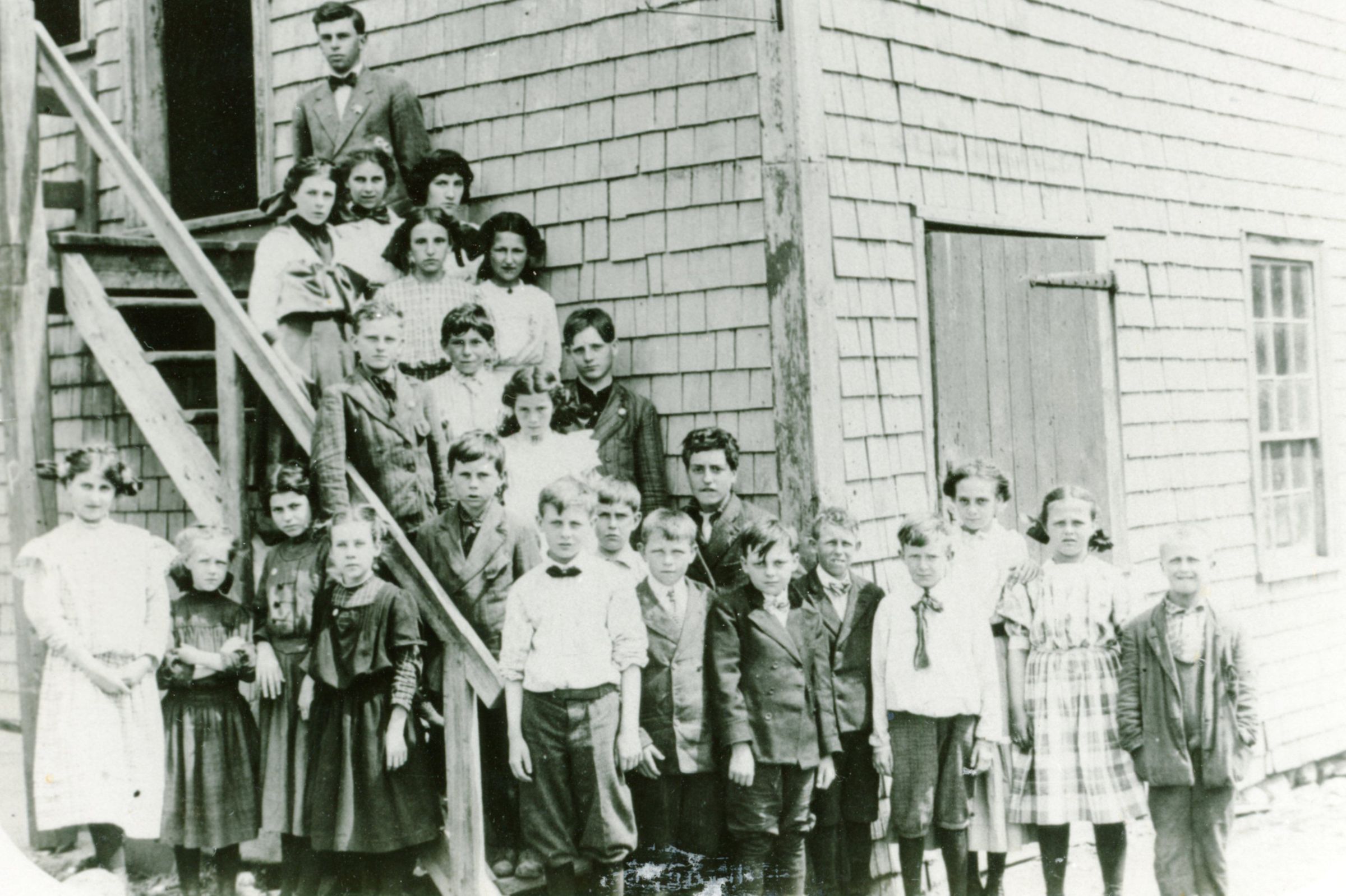 Dennysville Grammar School, Dennysville, Maine, 1911-12; Harold Varney was the teacher, having among his pupils: Edmund Allen, Edith Benner, Eva Benner, Mildred Boyce, Vernon Brown, George Dudley, Henry Farley, James Farley, Viola Farley, Louis Gardner, Richard Gardner, Eva Higgins, Blanche Keezer, Gilbert Leighton, Albert Lincoln, Archie MacCarlie, Lewellyn Phinney, Bessie Preston, Grace Preston, Wilhelmina Pushee, Faith Sprague and Horace Tuell.