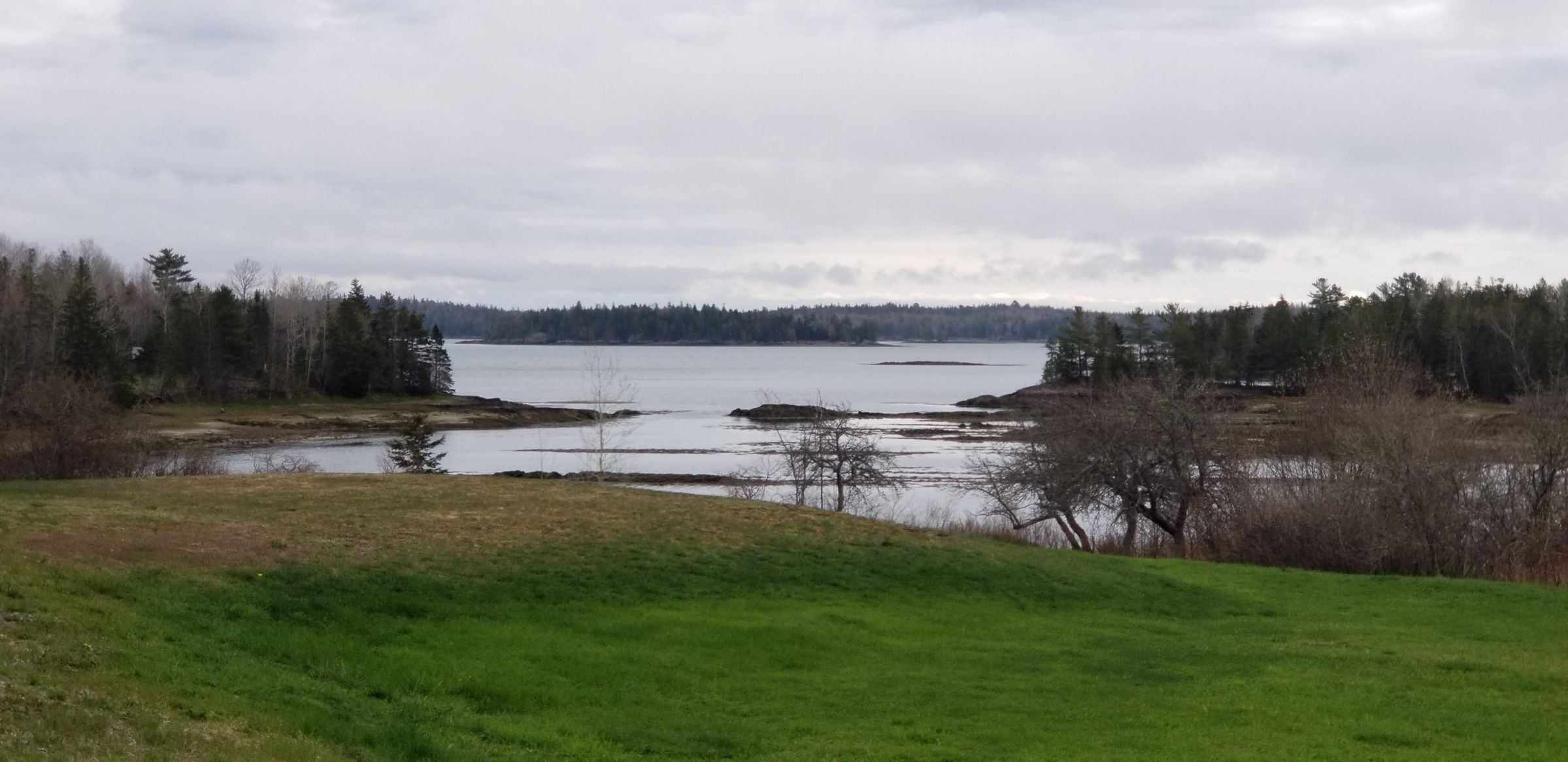 Birch Islands, Edmunds, Maine; In the foreground are the Birch Islands, and beyond them across the Dennys Bay is Dram Island, in this view from the Hallowell Farm on the South Edmunds Road.